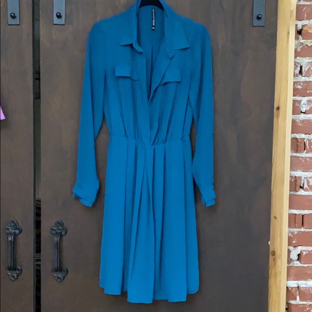 Teal flowing dress. Above knees
